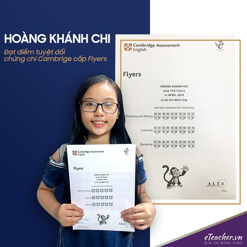 Hoang Khanh Chi receiving her Cambridge Flyers certificate